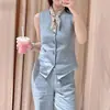 Elegante y estiloso conjunto de moda para mujer 2026 nuevo modelo chaleco sin mangas de corte ajustado con cuello en V y pantalones de pierna ancha conjunto de dos piezas