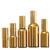 Botella de aceite esencial con galvanoplastia de oro, subbotella cosmética, botella de spray, botella de vidrio prensado, botella de loción crema a prueba de luz