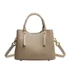 Bolsas de mano al por mayor transfronterizas, nuevos bolsos de hombro simples en bloques de color, bolsos versátiles y de moda para el uso diario, bolsas personalizadas