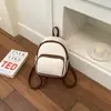 Bolso de mujer elegante y moderno con una textura única, nueva colección 2026, color liso simple, mochila de viaje mini casual y a la moda