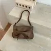 Bolsa de Design Único de Nicho Feminina 2026 Nova Outono Versátil Bolsa Transversal Bolsa de Mão Exquisita Bolsa Tote Pequena Super Quente
