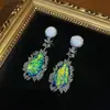Estilo Occidental Bronce Antiguo Chapado en Oro Blanco de 18K, Combinado con Diseño de Ágata Imitación, Pendientes de Lujo de Nicho con Sentido de Artesanía y Elegancia