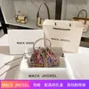 Uma geração da bolsa popular deste ano com lantejoulas e strass 2023 nova bolsa de mão com corrente e franjas atacado