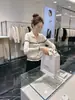 Cárdigan de punto a rayas de alta gama con cuello polo para mujer, nueva camisa de manga larga de otoño, elegante y a la moda, que rejuvenece, top estilo para ir al trabajo
