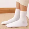 Calcetines de Venta Caliente Transfronteriza al por Mayor, Calcetines Desechables de Color Sólido Negro y Blanco, Calcetines de Algodón Unisex, Calcetines Desechables Diarios de Longitud Media-Corta Anti-Olor