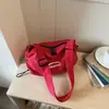 Bolso de Lona Roja Plegado para Mujer 2026 Nuevo Bolso Cruzado Deportivo de Nailon con Correa al Hombro Diseño de Nicho Bolso Dumpling
