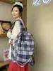 Nova Mochila Xadrez Versátil da Moda Ultraleve Casual para Estudantes do Ensino Fundamental e Médio Mochila de Grande Capacidade Atacado