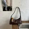 Bolso de Axila para Mujer 2026 Nuevo de Moda Verano Gama Alta Vintage Versátil para Viajar Bolso de Hombro Bolso Cruzado de Nicho