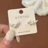 Nuevos Pendientes de Perlas Estilo Coreano 2026 Lujo Ligero Gama Alta Accesorios para Pendientes Brazaletes para Orejas Diseño de Nicho Sentido del Temperamento Pendientes de Botón para Mujer