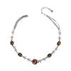 Collar de cuentas de ojo de tigre estilo Maillard para mujer, cadena de lana de clavícula de alta gama, accesorios sencillos de moda para hombres y mujeres.