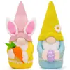 Muñeco de conejo de Pascua nuevo transfronterizo sosteniendo huevo de rábano de colores lindo muñeco de conejo decoración decoración del hogar