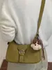Bolsa de Ombro Shuai Mi Jia para Uso Diário Feminino, Nova Coleção Outono 2026 Estilo Motociclista Vintage, Bolsa de Mão Moderna e Estilosa