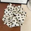 Goma para el pelo de lunares con borla de perlas y bloques de color, moderna y versátil, Scrunchie de alta gama, Cuerda para el pelo de tela satinada