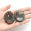 Pedra de sangue africana Pedra de massagem para polegar Jade natural oval Venda quente transfronteiriça 35 * 45mm raspagem descompressão pedra para esquecer preocupações