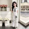 2026 Conjunto de Dos Piezas para Niñas de Verano, Moda Casual Deportiva, Pantalones de Pierna Ancha, Encaje, Manga Corta, Rayas, Cuello Marino Individual