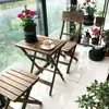Mesa e Cadeiras de Varanda para Apartamentos Pequenos Mini Moderno Simples Mesa de Chá de Madeira Maciça Combinação de Três Peças Mesa Redonda Mesa de Café de Lazer