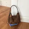 Bolsa de ombro tote feminina transfronteiriça, novo modelo 2026 para mulheres, design de nicho, bolsa de viagem leve para mulheres