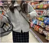 Abrigo para mujer 2023 otoño e invierno Nueva Moda cárdigan de punto holgado diseño suave pegajoso para mujer abrigo suéter con cremallera