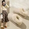Populares botas de nieve forradas de polar estilo Noreste para mujer, con un diseño mullido, nueva colección de invierno 2026, suela engrosada para mayor calidez y una plantilla cómoda y acolchada.