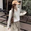 Estilo Novo Outono e Inverno Design de Cor Sólida Gola Polo Botões Suéter de Puxar Solto Manga Longa Simples Suéter Top Feminino