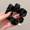 2025 Nueva Diadema Negra de Gama Alta Elástica Elegante para el Cabello Banda Elástica Sencilla Accesorios para el Cabello Estuche de Cuero para Mujer