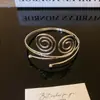 Explotaciones transfronterizas anillo de brazo exagerado Europa y Estados Unidos viento frío pulsera de metal pulsera de temperamento de sentido avanzado de lujo ligero pulsera de brazo pulsera de brazo al por mayor