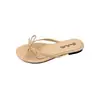 Sandalias de estilo delicado con tira fina y lazo para mujer, chanclas primavera/verano 2026, sencillas y elegantes, adecuadas para usar al aire libre