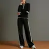 Roupas femininas de outono transfronteiriças europeias e americanas 2026 novo conjunto casual de moletom listrado esportivo e calça pantalona