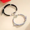 Pulsera de Pareja Sol y Luna Crepuscular para Hombre y Mujer Diseño de Nicho Ins Pulsera de Empuje y Tirón Incrustada de Diamantes Anillo Doble de Mobius Cuerda de Mano