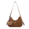 Bolso de axila retro con forma de media luna para mujer, nueva colección principios de otoño 2026, diseño de nicho, alto atractivo estético, bolso de hombro simple, bolso cruzado, estilo transfronterizo
