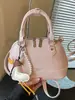 Bolso de mano minimalista transfronterizo para mujer, nuevo modelo 2026, elegante y versátil, bolso de hombro tipo concha, bolso cruzado de nicho