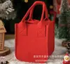 Nueva Bolsa de Fieltro Navideña Bolsa Tote de Nochebuena Bolsa de Dulces para Niños Bolsa de Regalo de Fieltro con Dibujos Animados Venta al por Mayor