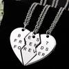 T389 AliExpress Joyería Más Vendida Pareja Puntada de Tres Pétalos Collar Corazón Roto Colgante de Tres Partes