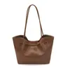 Bolso tote de gran capacidad, color liso, estilo retro de alta gama, modelo nuevo 2026 para ir al trabajo, bolso de hombro simple, bolso único para el antebrazo para mujer