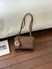 Bolso de axila de nicho estilo coreano transfronterizo para mujer, nuevo diseño de alta gama, versátil para ir al trabajo, bolso de mano para salir, bolso de hombro