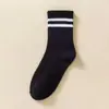 Calcetines Zhuji al por mayor para niñas a rayas estilo universitario primavera verano absorbentes de sudor transpirables calcetines cortos para el tobillo fuente de puesto callejero de moda