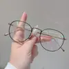 Gafas Danyang titanio puro 8G hombre y mujer montura retro se pueden equiparar con gafas para miopía lente 1.74 anti luz azul 2079