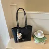 Bolso tipo cubo con patrón tejido de moda, bolso cruzado único y moderno, estilo coreano, elegante para el trabajo y los desplazamientos, bolso de mano casual