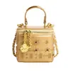 Bolsa mini personalizada para labiales transfronteriza 2026, nueva bolsa cruzada tachonada primavera/verano, bolso de hombro versátil y de moda para mujer