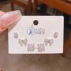 Verano nuevo chapado en oro real exquisitos tres pares de aretes pequeños de alto sentido pequeños frescos dulces aretes de temperamento combinables