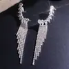 Bestseller Transfronterizo Europeo y Americano Moda Temperamento Personalidad Pendientes de Borla de Pedrería para Mujer Lujo Ligero Versátil Temperamento Clips para Orejas Pendientes de Botón Tendencia