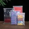Bolsas con cierre esmerilado en stock, Bolsas transparentes de PE antiarrugas, Bolsas autosellables para ropa, Bolsas de plástico gruesas de EVA para almacenamiento