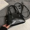 Bolso bandolera de hombro de moda para mujer, estilo coreano, estilo nicho, sencillo y portátil, de estilo coreano, combina con todo, primavera y verano.