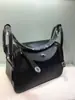 Bolsas de medicina al por mayor bolsas para mujer cuero de capa superior con textura de lichi bolsa de enfermera hombro portátil bolsa Lindi bolsa almohada Europa y Estados Unidos