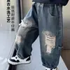 Roupas Infantis de Início de Outono Calças de Outono para Meninos 2026 Novo Estilo Crianças Descoladas Estilo Coreano Jeans Rasgado Bebê Estilo Primavera e Outono
