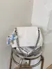 Bolso tejido para mujer, gran capacidad, nuevo modelo 2026, bolso cruzado versátil casual con cadena, adecuado para la escuela y el trabajo, bolso tote