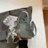 Bolsa Feminina Primavera 2026 Moda Bolsa de Mão Simples Popular Estilo Estrangeiro Bolsa de Ombro Único Bolsa Transversal Casual Bolsa Feminina