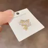 Colgante de Perla de Zirconia de Doble Capa Clip de Oreja de Estrella Lujo Ligero Clip de Cartílago de Oreja de Gama Alta Pendientes de Diseño sin Perforación Venta al por Mayor