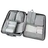 Nueva bolsa de almacenamiento catiónica impermeable de siete piezas para viajes bolsa organizadora de equipaje multi-especificación ropa interior traje portátil