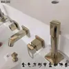 Gabinete de baño grifo estilo europeo dorado doble lavabo juego de cuatro piezas extraíble dividido combinación Lavabo grifo de tres-cuatro agujeros